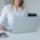 Woman Using Silver Laptop